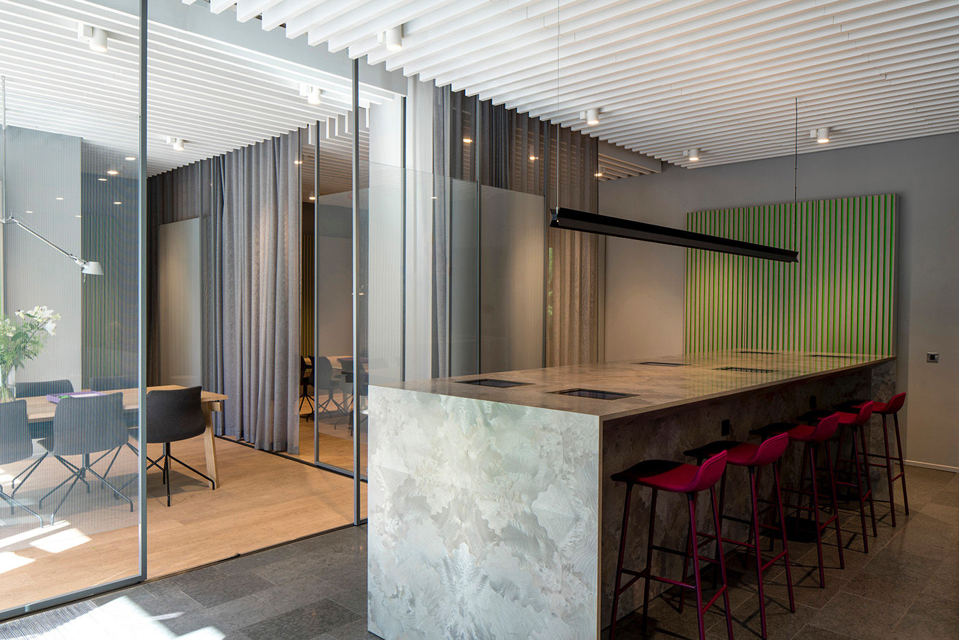 Office for Skandinaviska Enskilda Banken AB, abbreviated SEB, Soft materials are mixed with concrete and wooden furniture